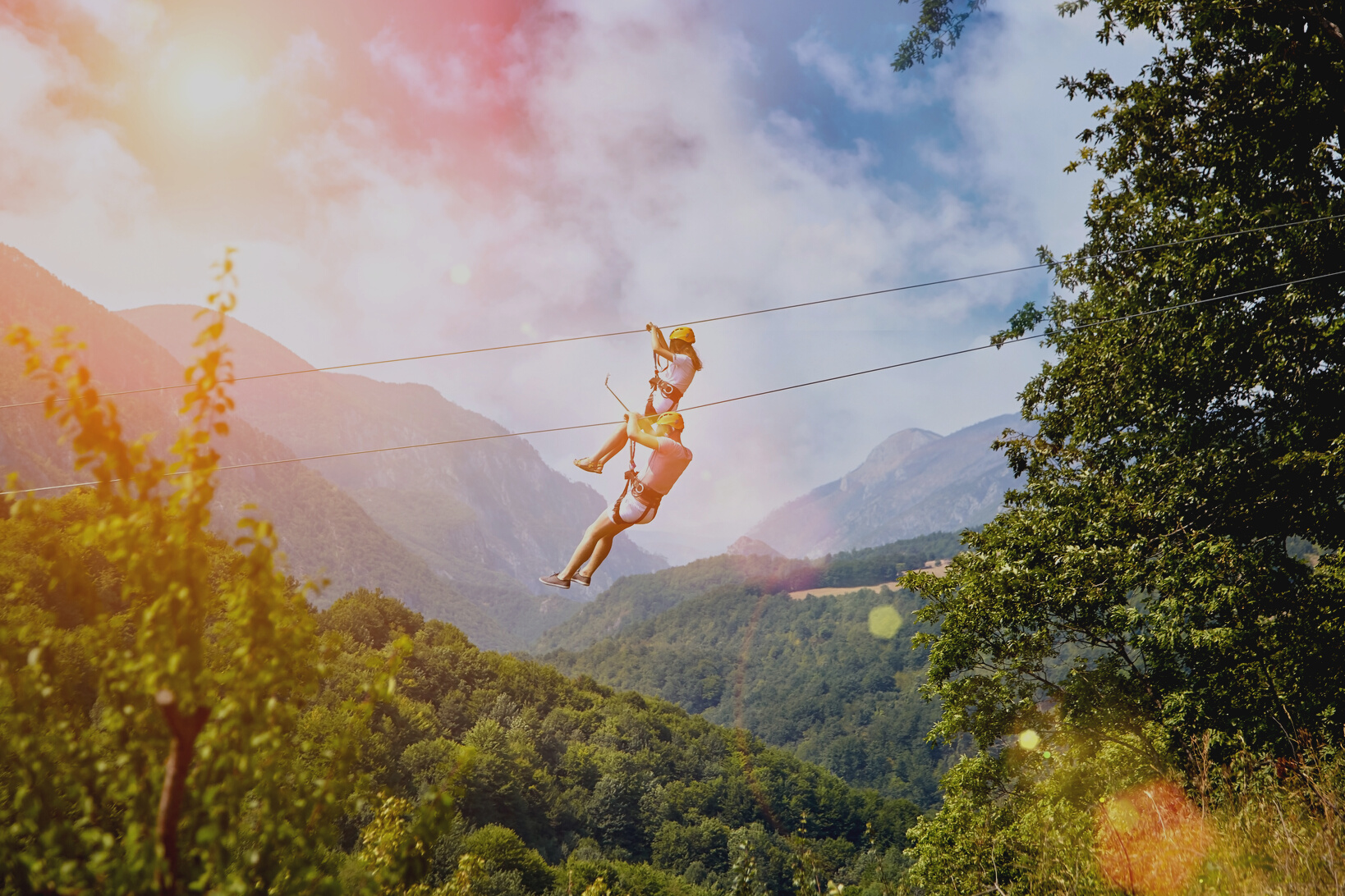 Tourists Ride on the Zipline